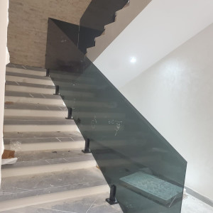 Glass staircase railing installation in Muscat and Sohar Oman 16 - تركيب درابزين درج زجاج… – glass railing and balustrade installation – Al…