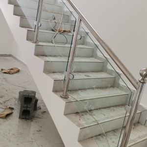 Glass staircase railing installation in Muscat and Sohar Oman 19 - تركيب درابزين درج زجاج… – glass railing and balustrade installation – Al…